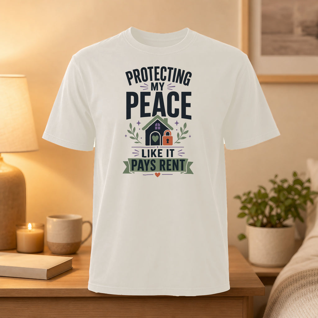 White t-shirt with "Protecting My Peace Like It Pays Rent" graphic.