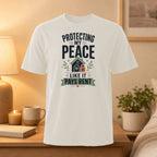 White t-shirt with "Protecting My Peace Like It Pays Rent" graphic.