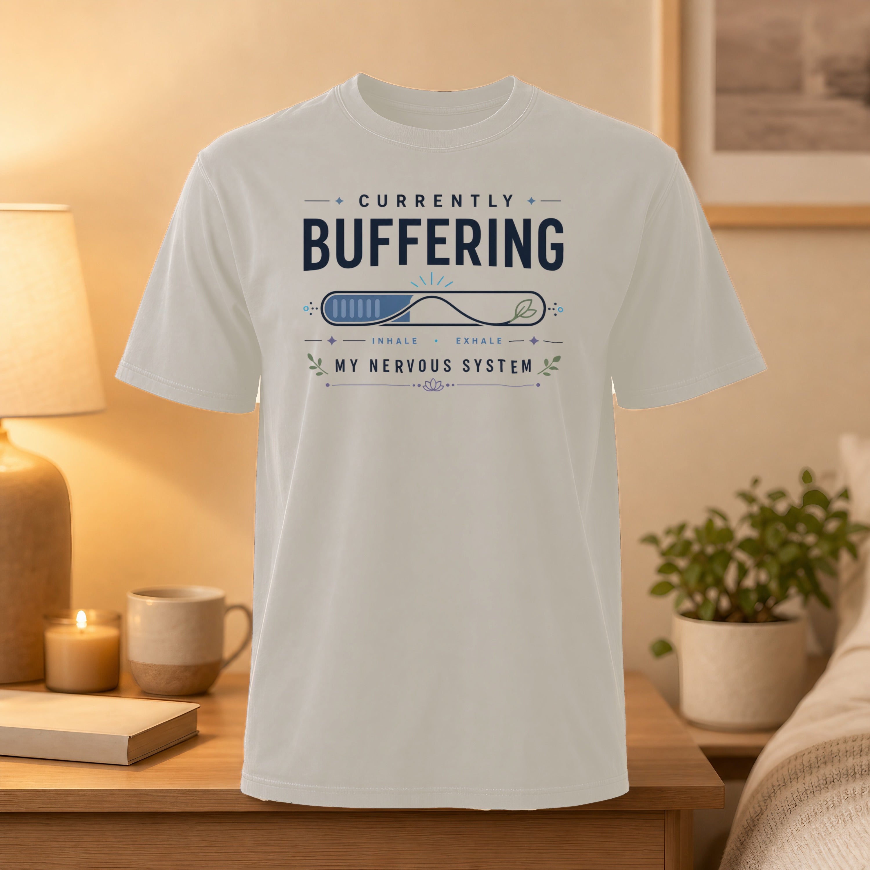 White t-shirt with "CURRENTLY BUFFERING MY NERVOUS SYSTEM" text and breathing graphic.