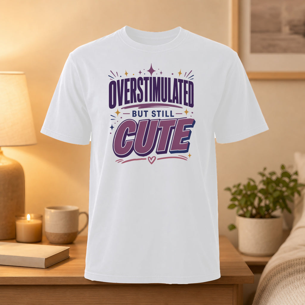 White t-shirt with "OVERSTIMULATED BUT STILL CUTE" graphic.