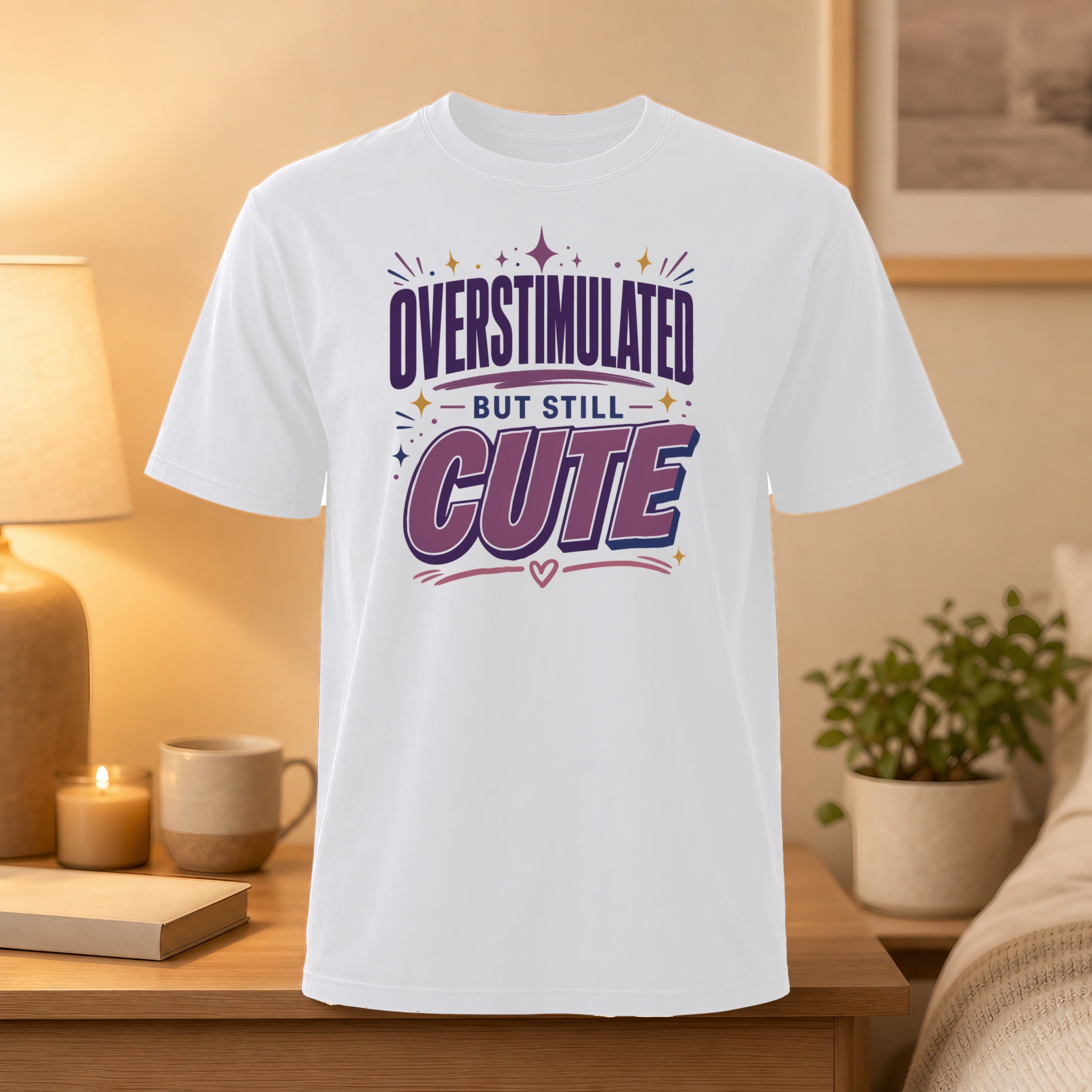 White t-shirt with "OVERSTIMULATED BUT STILL CUTE" graphic.