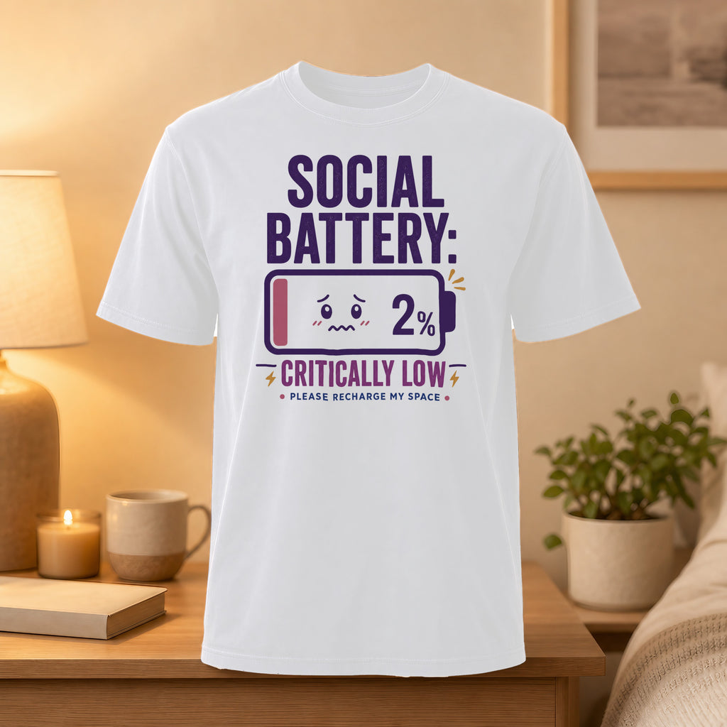 White t-shirt with "SOCIAL BATTERY: CRITICALLY LOW 2%" text and battery graphic.