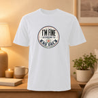 White t-shirt with circular graphic saying "I'M FINE ACCORDING TO NO ONE".