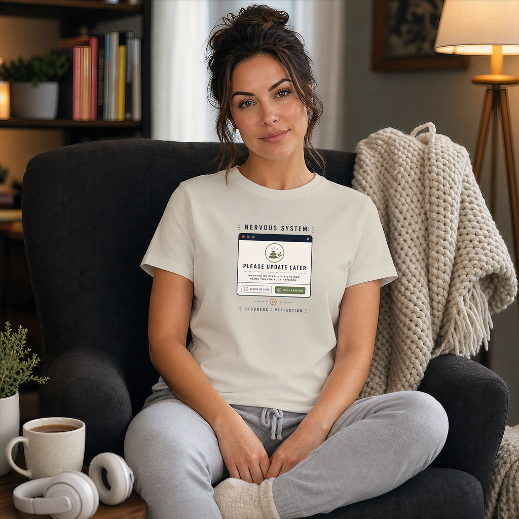 Woman in t-shirt with "Nervous System: Please Update Later" text.