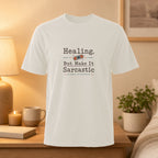 White t-shirt with "Healing, But Make It Sarcastic" text and a bandage graphic.
