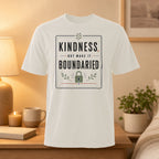 White t-shirt with "Kindness, but make it a boundary" text and lock graphic.