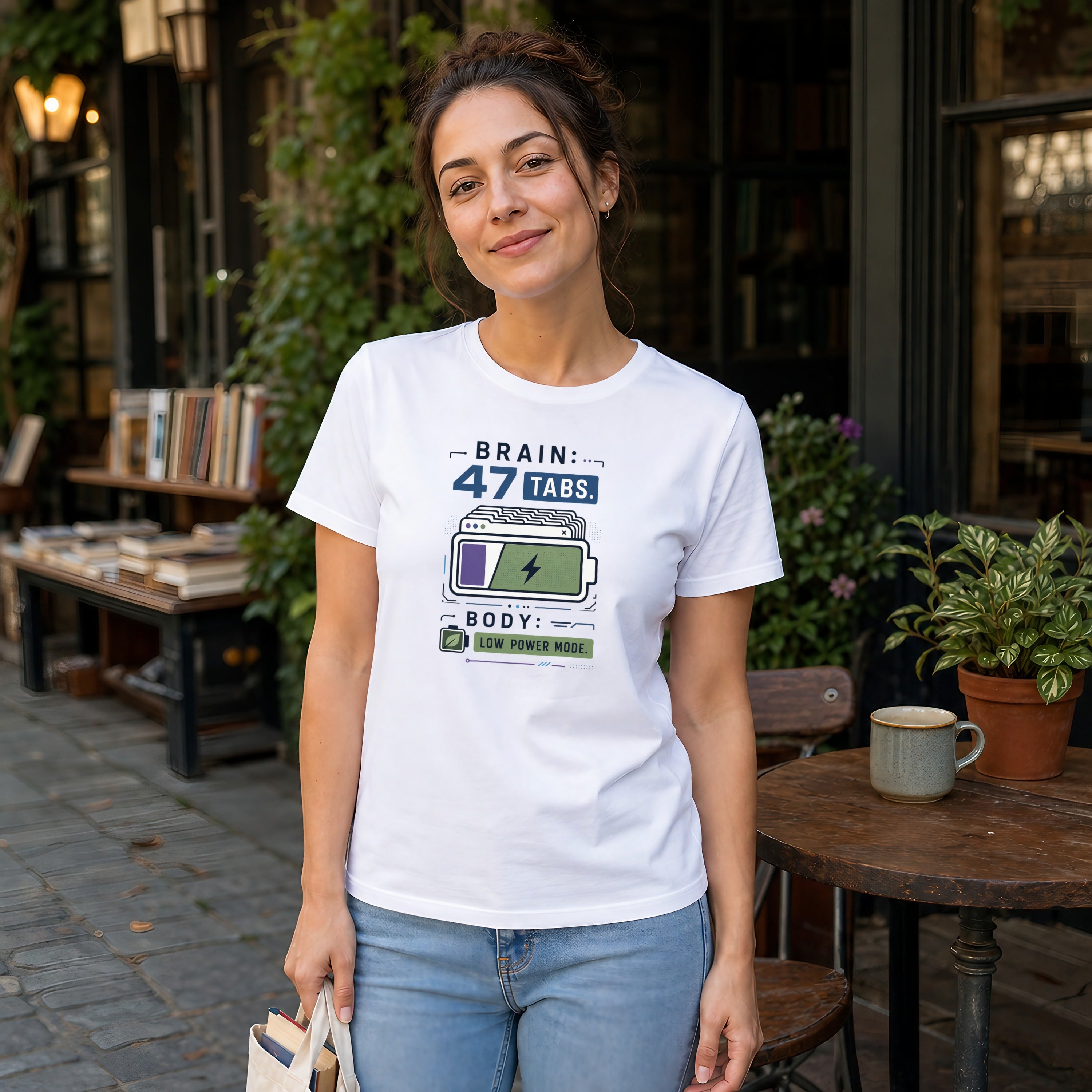 Woman wearing t-shirt with "BRAIN: 47 TABS. BODY: LOW POWER MODE." text.