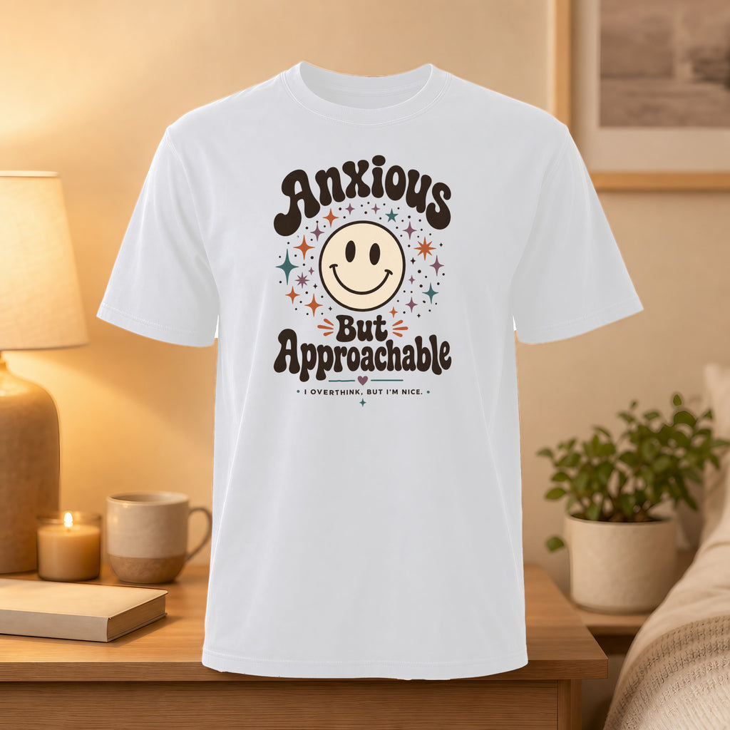 White t-shirt with "Anxious But Approachable" and smiley face graphic.