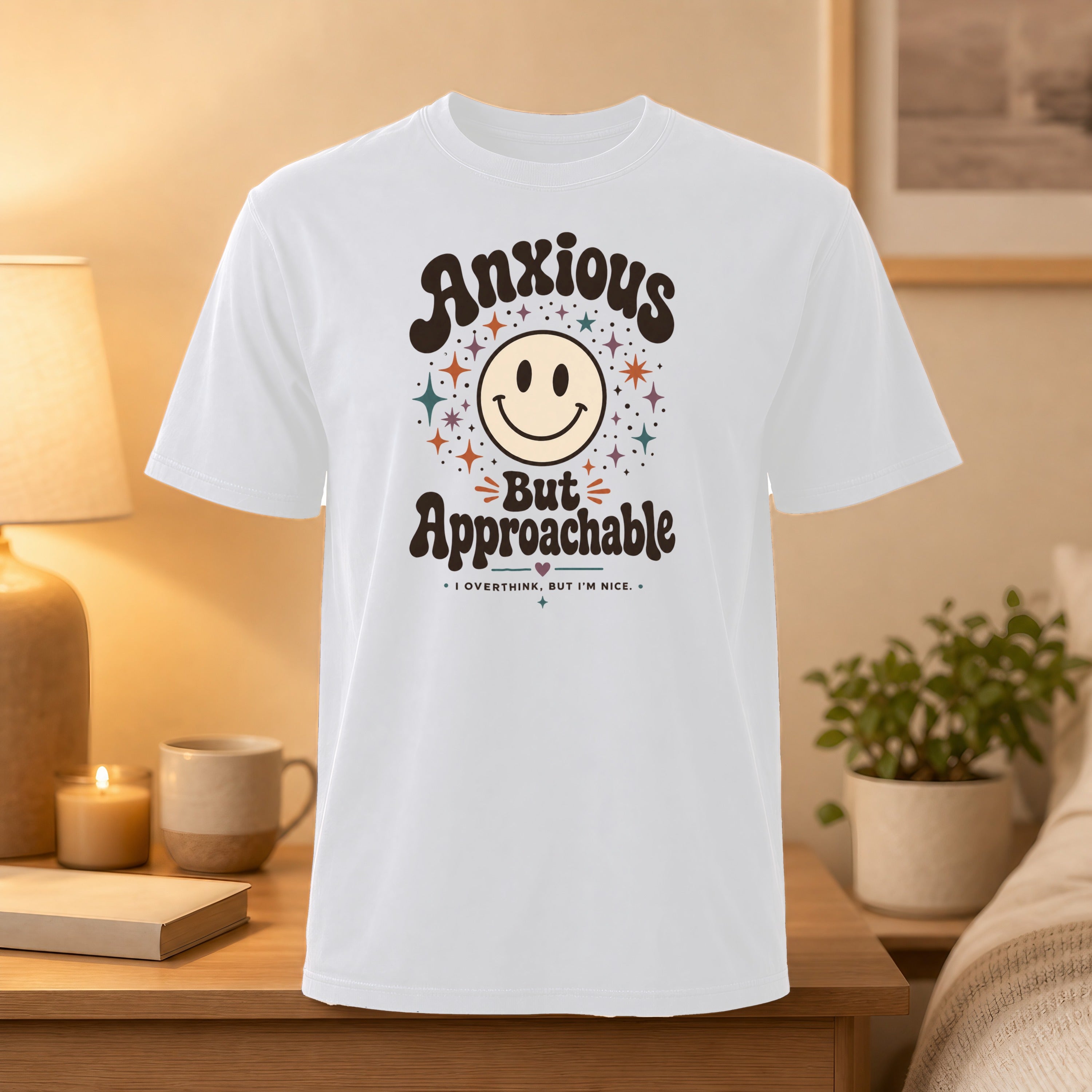 White t-shirt with "Anxious But Approachable" and smiley face graphic.