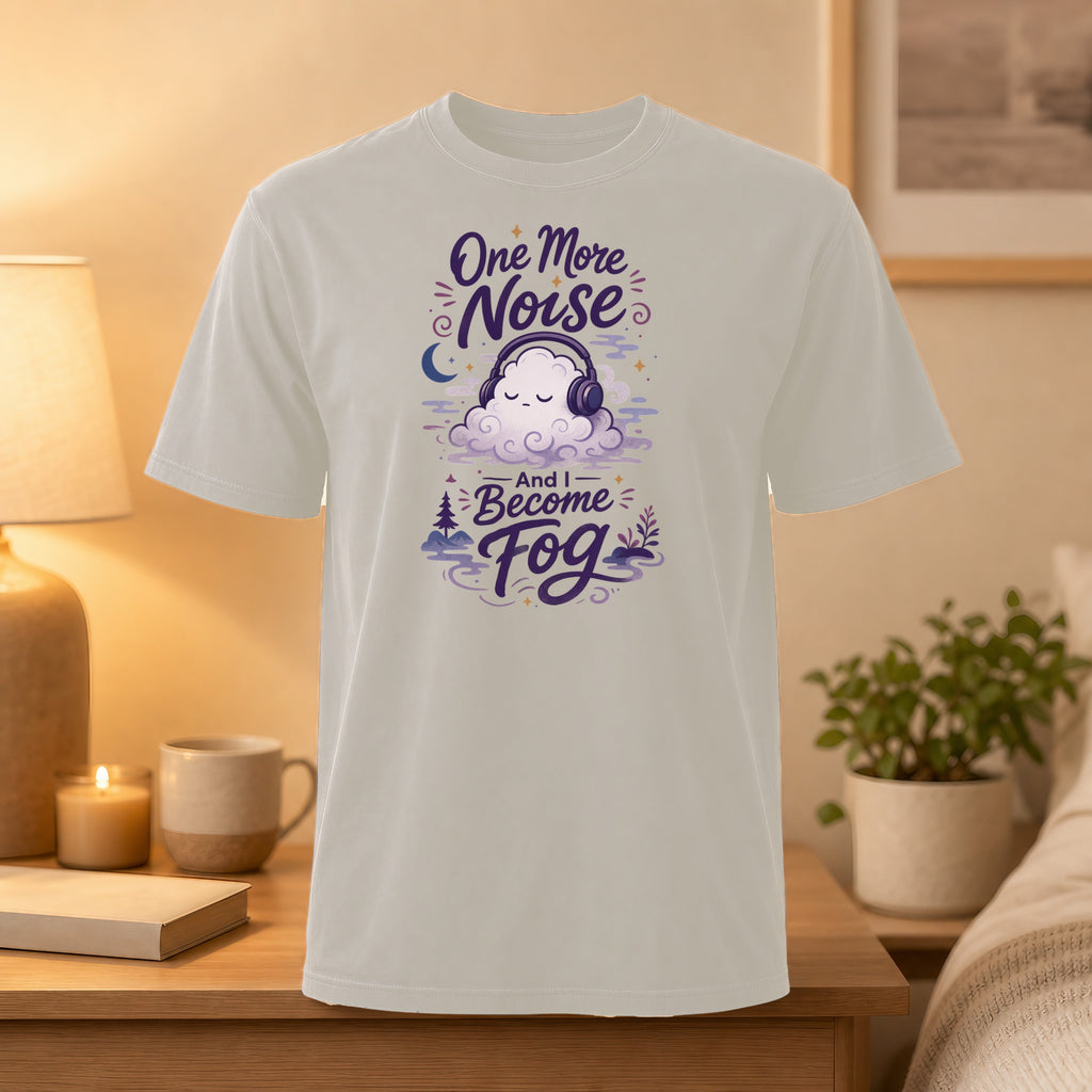 T-shirt with purple text "One More Noise And I Become Fog" and cloud headphones graphic.