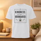 White t-shirt with a black framed graphic that says "Kindness, but make it Boun­daried" and a lock icon.